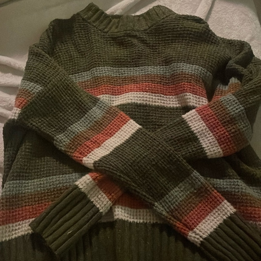 Striped knit sweater.